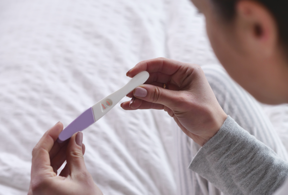 TWO positive pregnancy tests but negative blood test?? - September